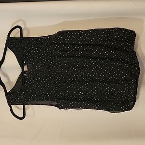 Sleeveless polka dot blouse